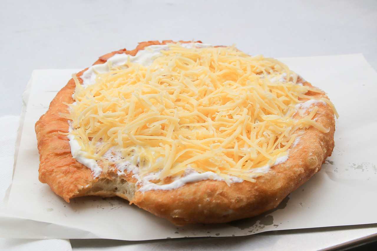 Lángos with sour cream and cheese